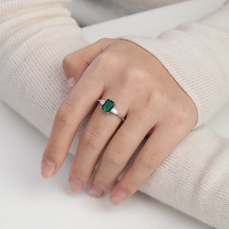 Royal Green Realm · 2 carat cultivated emerald Baquette shaped moissanite ring