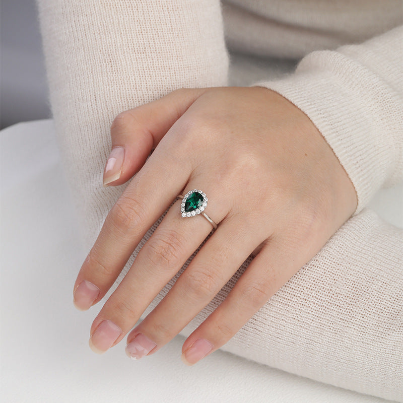 The Wizard of Oz · 1.5-carat pear shaped moissanite diamond ring