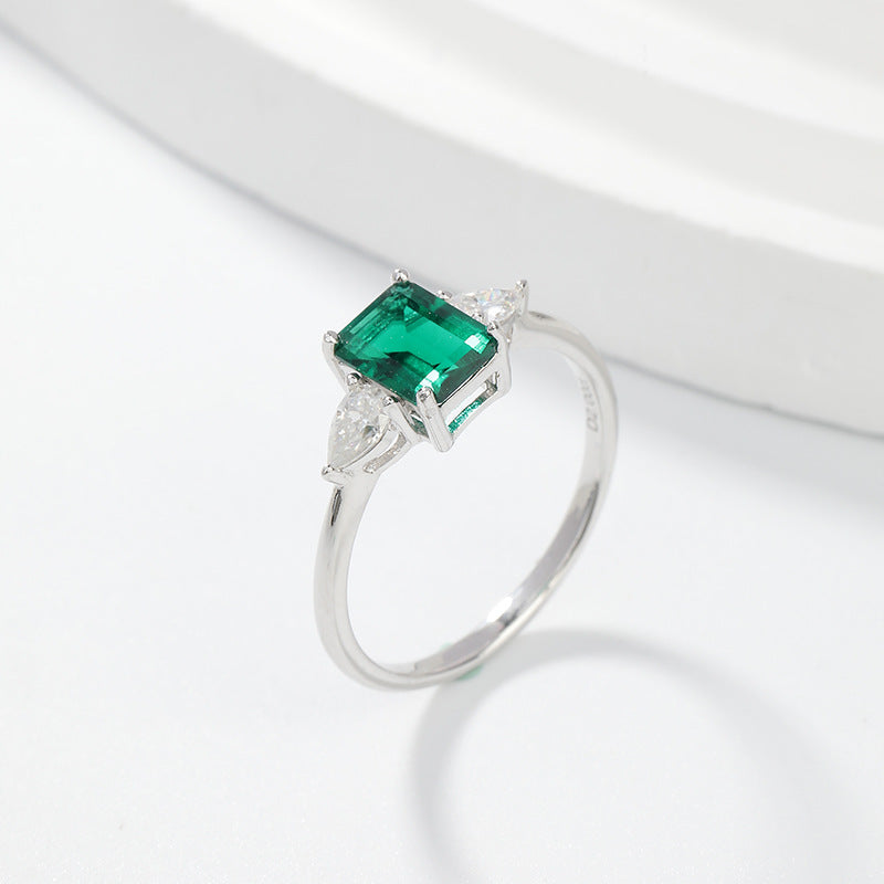 Royal Green Realm · 2 carat cultivated emerald Baquette shaped moissanite ring
