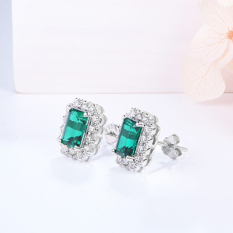 The Wizard of Oz · 1 carat cultivated emerald earrings