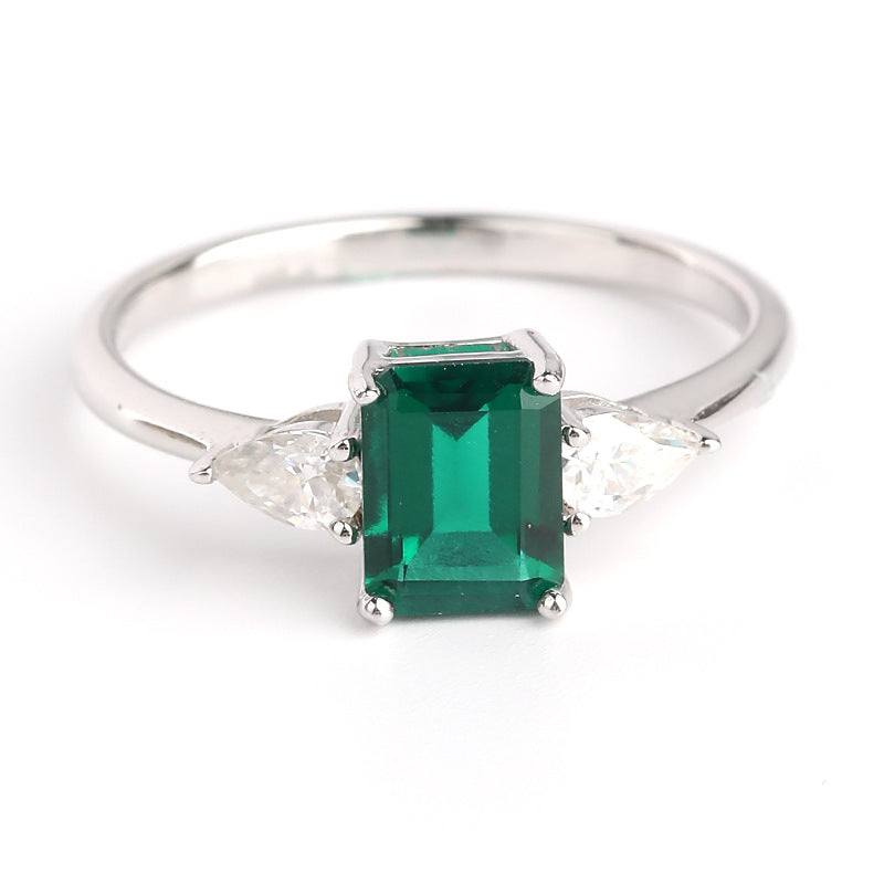 Royal Green Realm · 2 carat cultivated emerald Baquette shaped moissanite ring