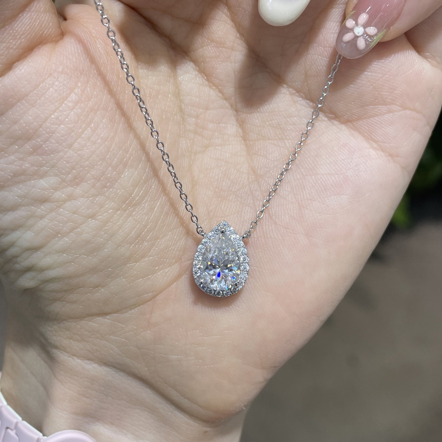 Rainbow Aurora · 2 carat pear shaped moissanite necklace