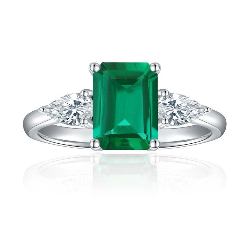 Royal Green Realm · 2 carat cultivated emerald Baquette shaped moissanite ring