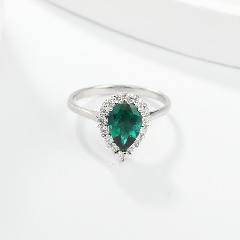 The Wizard of Oz · 1.5-carat pear shaped moissanite diamond ring