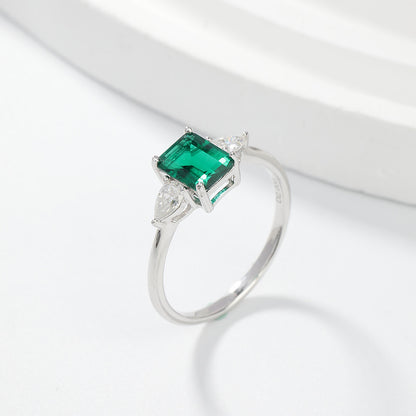 Royal Green Realm · 2 carat cultivated emerald Baquette shaped moissanite ring