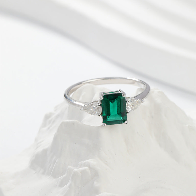 Royal Green Realm · 2 carat cultivated emerald Baquette shaped moissanite ring