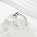 Royal Green Realm · 2 carat cultivated emerald Baquette shaped moissanite ring