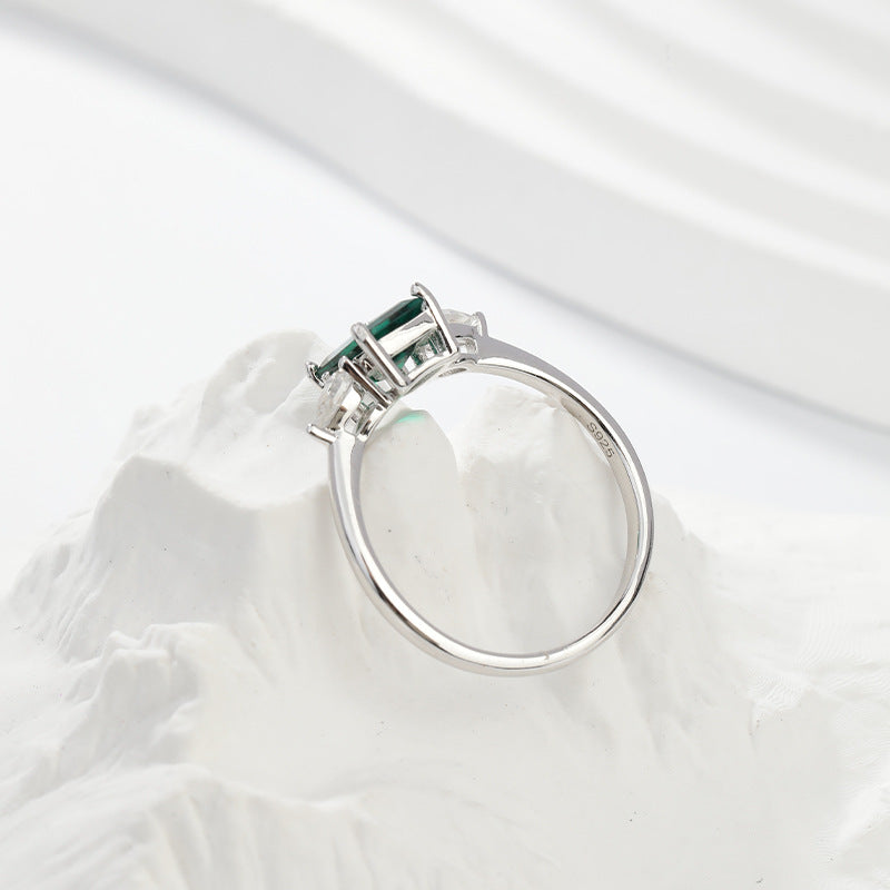 Royal Green Realm · 2 carat cultivated emerald Baquette shaped moissanite ring