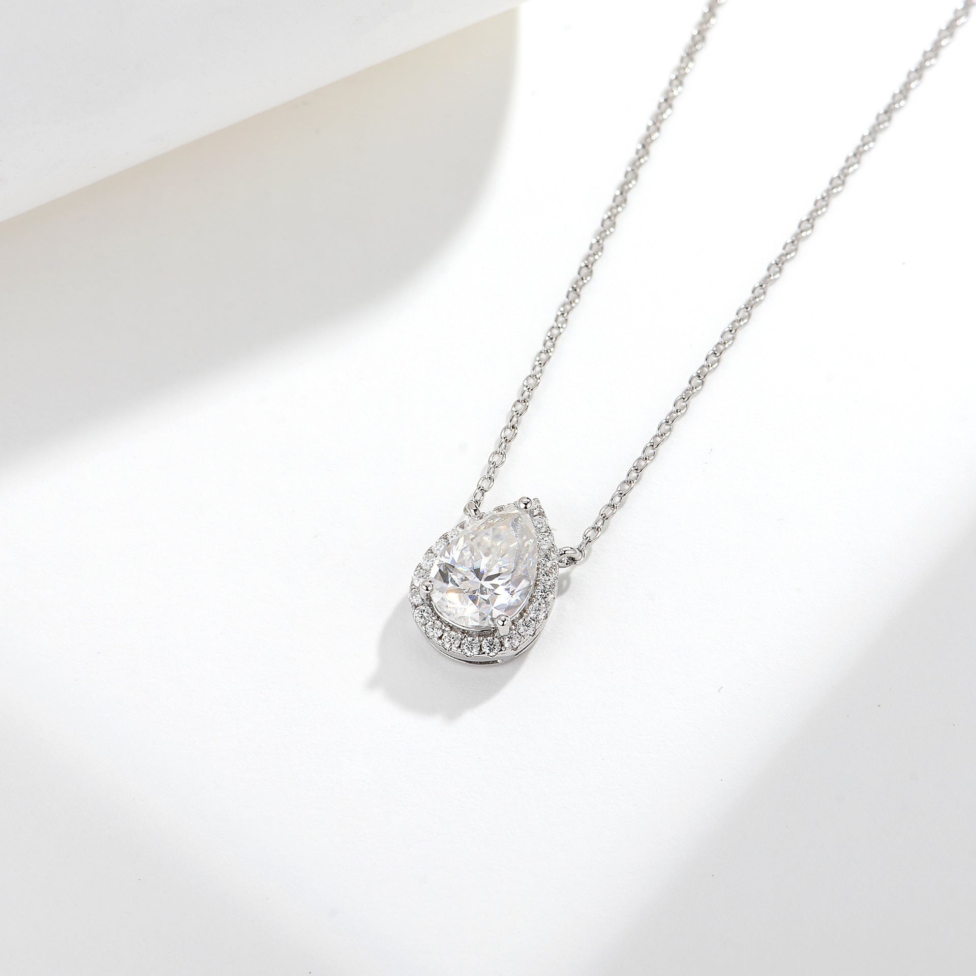 Rainbow Aurora · 2 carat pear shaped moissanite necklace
