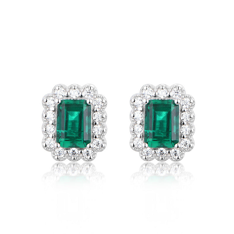 The Wizard of Oz · 1 carat cultivated emerald earrings