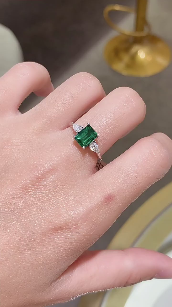 Royal Green Realm · 2 carat cultivated emerald Baquette shaped moissanite ring